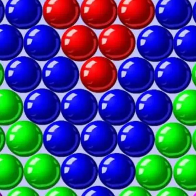 Cannon aiming at a ceiling of coloured bubbles