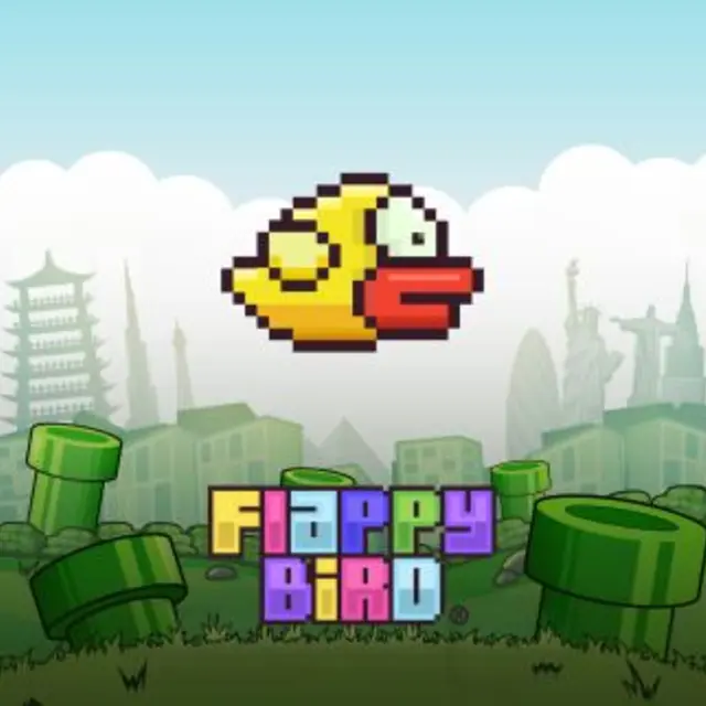 Small bird flying through a narrow gap between green pipes