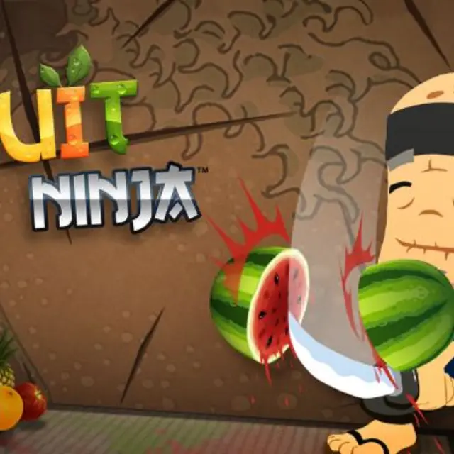 Fruit being sliced mid-air by a swipe trail with a bomb nearby
