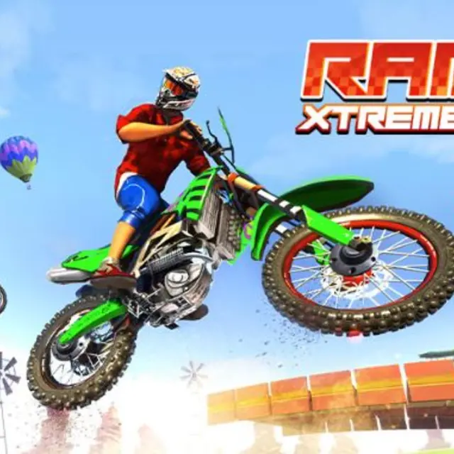 Motorbike flipping in mid air above a floating ramp